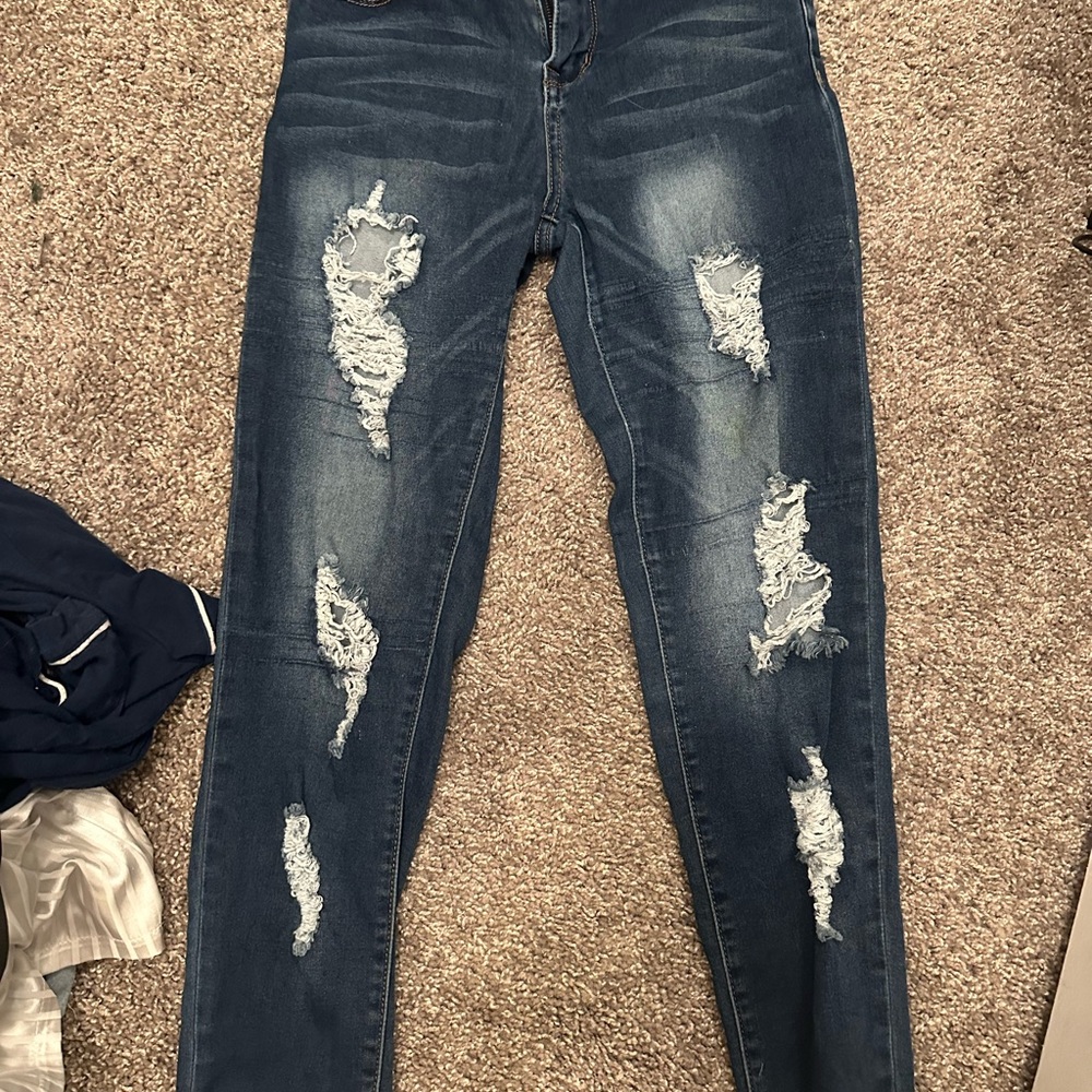 Distressed Blue Jeans